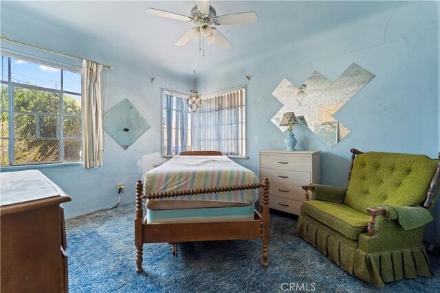 100 E Buena Vista St, Barstow, CA 92311 - bedroom with carpet flooring and ceiling fan