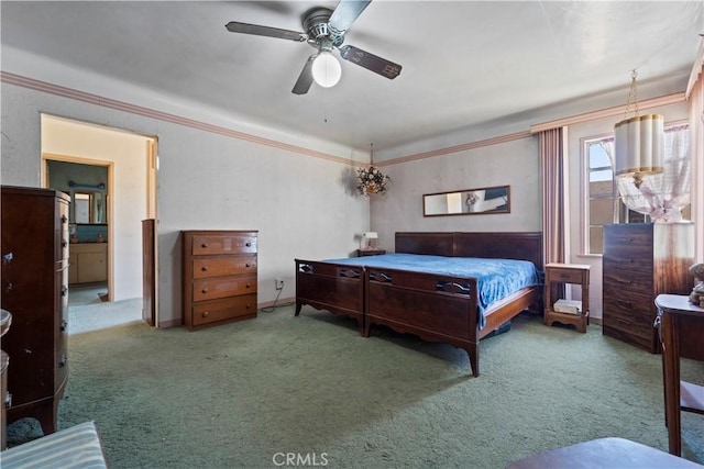 100 E Buena Vista St, Barstow, CA 92311 - carpeted bedroom featuring crown molding and a ceiling fan