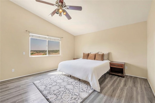 44601 Jamin Cir, Temecula, CA 92592 - bedroom with vaulted ceiling, wood finished floors, and a ceiling fan