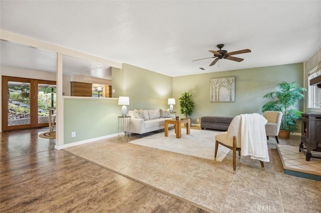 5500 Valentina, Atascadero, CA 93422 - living room featuring wood finished floors, a ceiling fan, and a wood stove