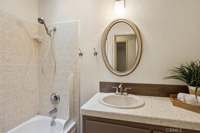 5500 Valentina, Atascadero, CA 93422 - bathroom featuring shower / bathtub combination, vanity, and a textured wall