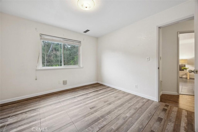 5500 Valentina, Atascadero, CA 93422 - empty room featuring wood finished floors and baseboards