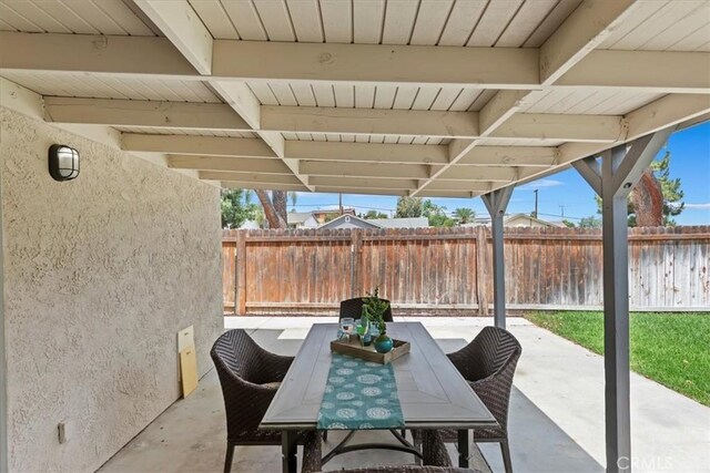 2266 Mcneil Cir, Corona, CA 92882 - fenced backyard featuring a patio and outdoor dining area