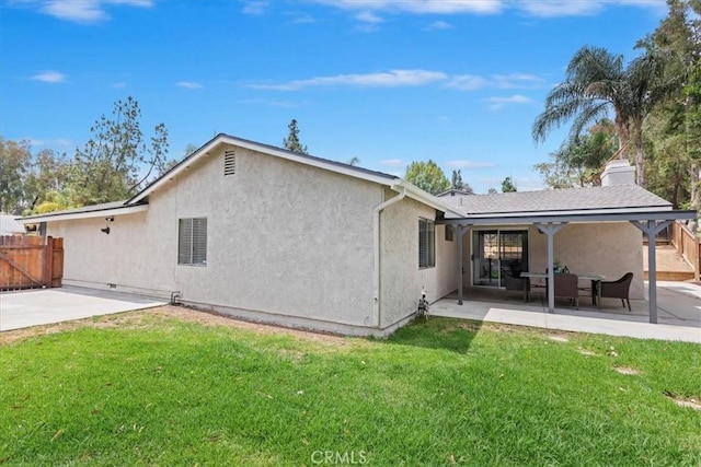 2266 Mcneil Cir, Corona, CA 92882 - rear view of property with a patio area and stucco siding
