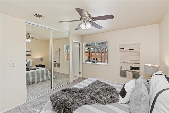 2266 Mcneil Cir, Corona, CA 92882 - carpeted bedroom featuring a closet and a ceiling fan