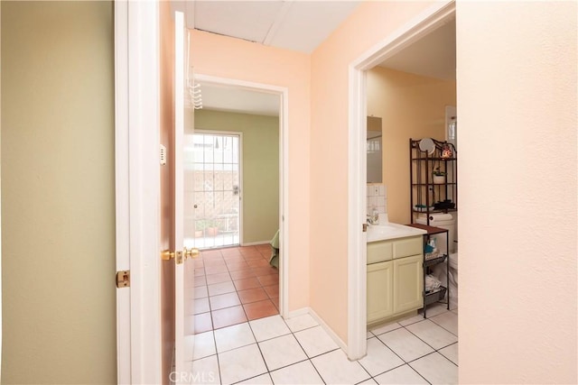1203 E 33rd St, Los Angeles, CA 90011 - hallway featuring light tile patterned floors