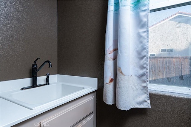 25540 Riley Cir, Menifee, CA 92585 - bathroom with a textured wall and vanity