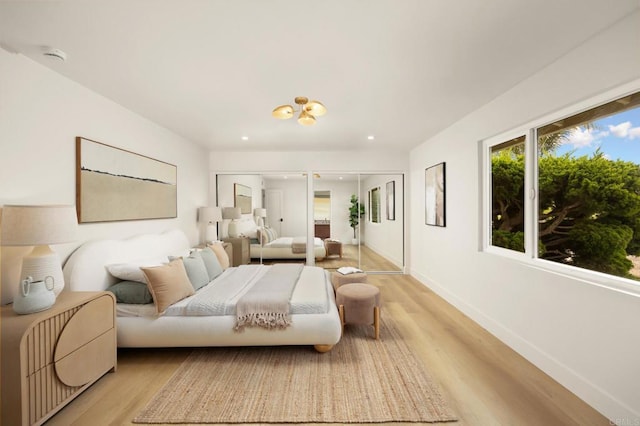 113 Via Breve Unit 23, San Clemente, CA 92672 - bedroom featuring light wood-style flooring and recessed lighting
