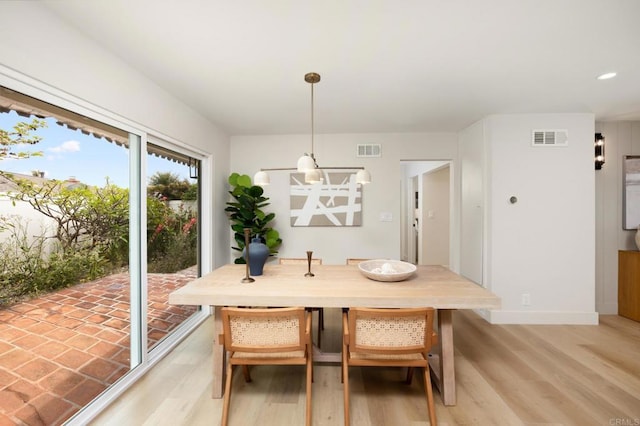 113 Via Breve Unit 23, San Clemente, CA 92672 - dining space with light wood-style floors