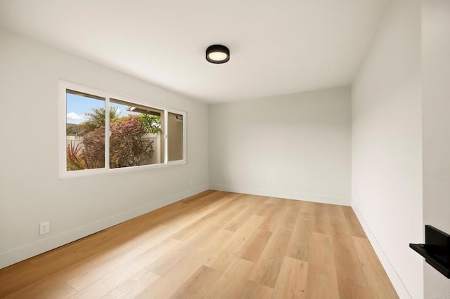 113 Via Breve Unit 23, San Clemente, CA 92672 - empty room featuring light wood finished floors and baseboards