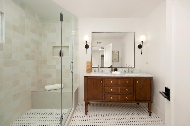 113 Via Breve Unit 23, San Clemente, CA 92672 - bathroom with a stall shower and double vanity