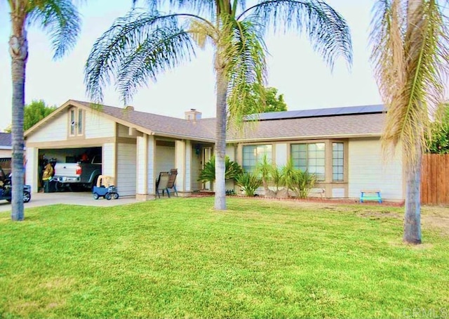 29614 Mount Bachelor Way, Sun City, CA 92586 - single story home featuring a garage, roof mounted solar panels, a chimney, and driveway