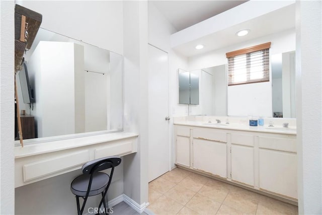 25165 Pebble Creek Way, Moreno Valley, CA 92551 - full bathroom featuring double vanity, tile patterned floors, and recessed lighting
