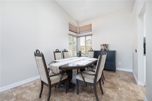 25165 Pebble Creek Way, Moreno Valley, CA 92551 - dining room with high vaulted ceiling and baseboards