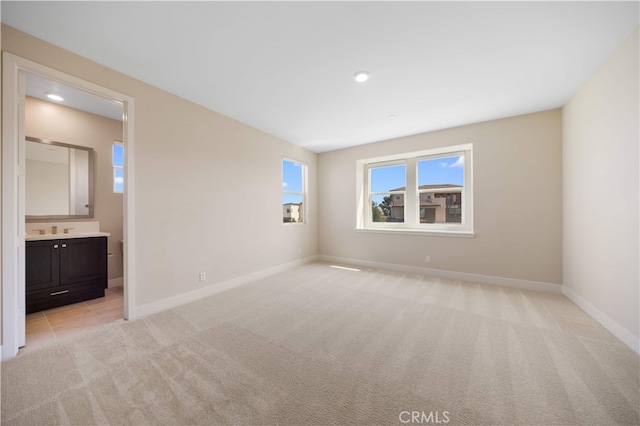 125 Character, Irvine, CA 92618 - unfurnished room featuring light carpet and recessed lighting