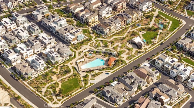 125 Character, Irvine, CA 92618 - aerial view of property and surrounding area featuring a pool and nearby suburban area