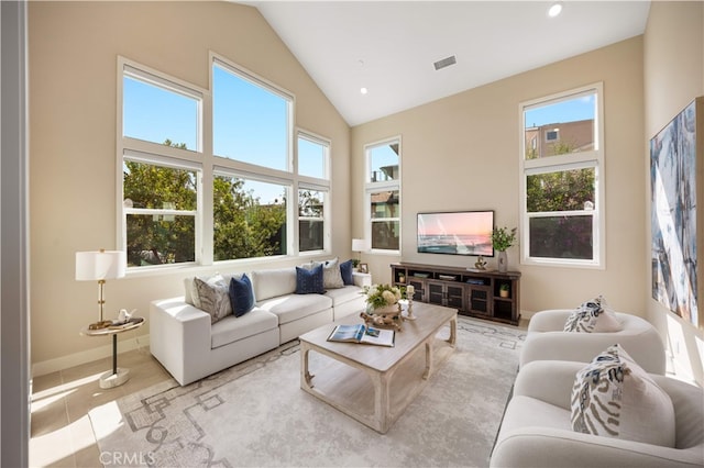 125 Character, Irvine, CA 92618 - living area with high vaulted ceiling, recessed lighting, and tile patterned flooring