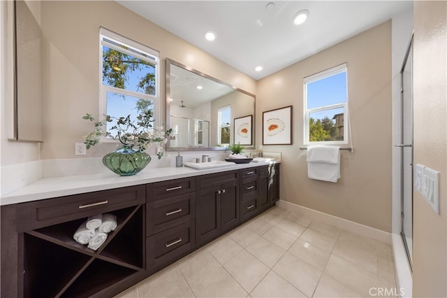 125 Character, Irvine, CA 92618 - full bath with plenty of natural light, double vanity, a shower with shower door, tile patterned flooring, and recessed lighting