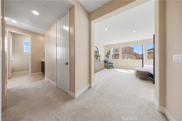 125 Character, Irvine, CA 92618 - corridor with light colored carpet and recessed lighting