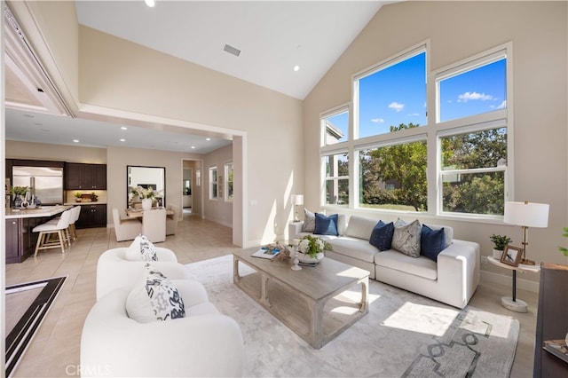 125 Character, Irvine, CA 92618 - living area with high vaulted ceiling, recessed lighting, and light tile patterned flooring