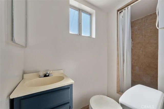 5868 Estrella Ave, Los Angeles, CA 90044 - bathroom featuring vanity and curtained shower