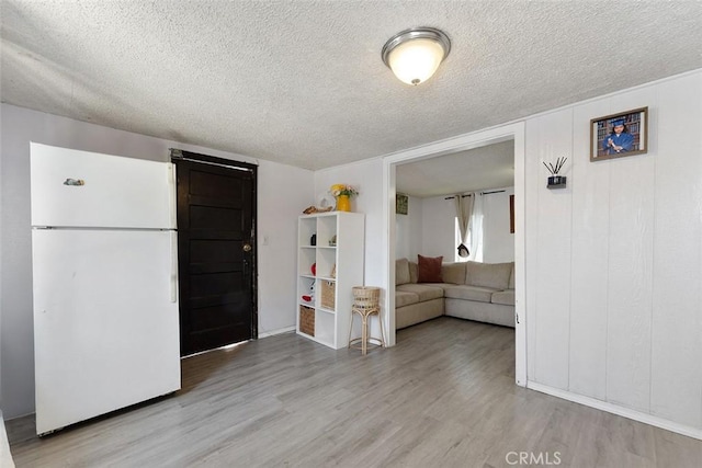 5868 Estrella Ave, Los Angeles, CA 90044 - living area with a textured ceiling and wood finished floors