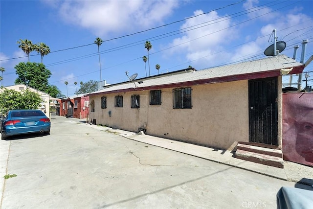 5868 Estrella Ave, Los Angeles, CA 90044 - view of home's exterior featuring stucco siding
