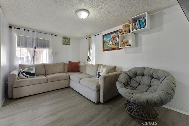 5868 Estrella Ave, Los Angeles, CA 90044 - living room with a textured ceiling and wood finished floors
