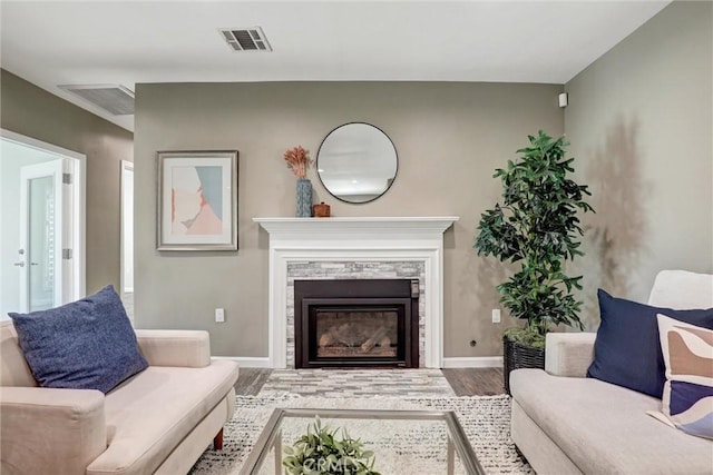 4437 Keever Ave, Long Beach, CA 90807 - living room featuring wood finished floors and a glass covered fireplace