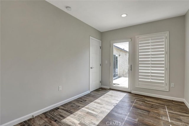 4437 Keever Ave, Long Beach, CA 90807 - unfurnished room featuring a smoke detector, wood finished floors, and recessed lighting