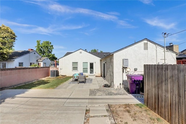 4437 Keever Ave, Long Beach, CA 90807 - rear view of house featuring a patio, a fenced backyard, and stucco siding