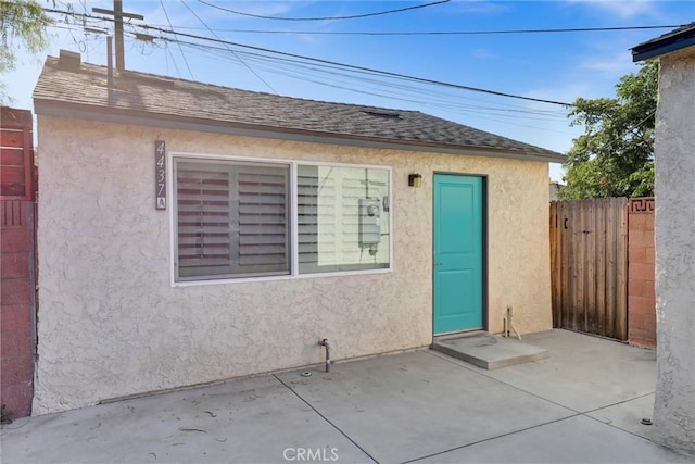 4437 Keever Ave, Long Beach, CA 90807 - entrance to property featuring a patio, stucco siding, and a shingled roof