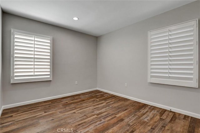 4437 Keever Ave, Long Beach, CA 90807 - empty room with wood finished floors and recessed lighting