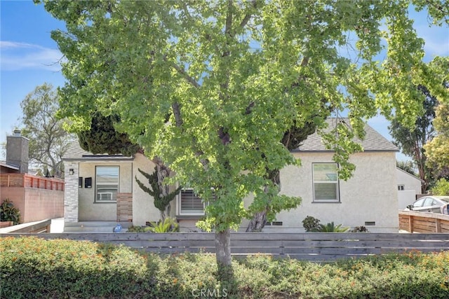 4437 Keever Ave, Long Beach, CA 90807 - obstructed view of property with stucco siding and roof with shingles