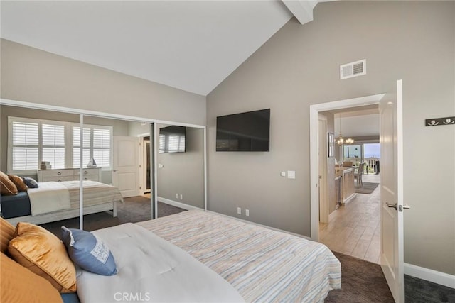 24532 Moonfire Dr, Dana Point, CA 92629 - bedroom featuring high vaulted ceiling, a chandelier, carpet, beam ceiling, and a closet