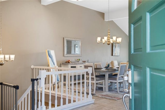 24532 Moonfire Dr, Dana Point, CA 92629 - dining area with a chandelier, wood finished floors, and lofted ceiling