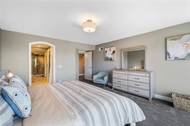 24532 Moonfire Dr, Dana Point, CA 92629 - carpeted bedroom featuring arched walkways and ensuite bathroom