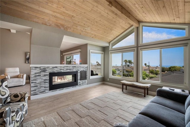 24532 Moonfire Dr, Dana Point, CA 92629 - living room featuring a fireplace, plenty of natural light, wooden ceiling, and wood finished floors