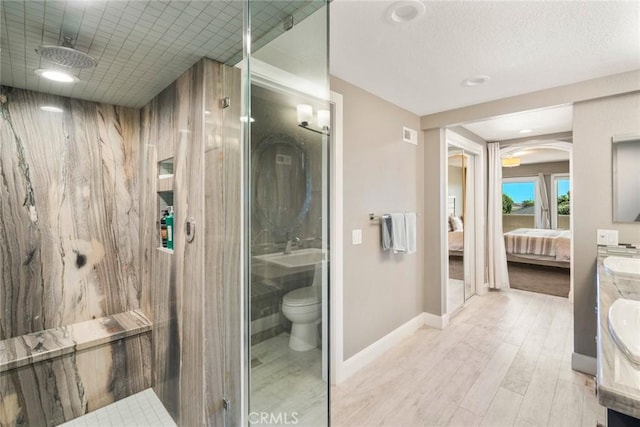 24532 Moonfire Dr, Dana Point, CA 92629 - full bath featuring ensuite bathroom, a stall shower, vanity, wood finished floors, and recessed lighting