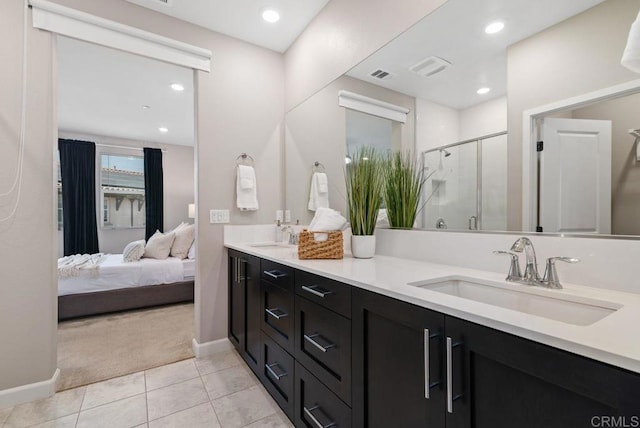 3510 Brody Way, Oceanside, CA 92056 - ensuite bathroom with double vanity, a shower stall, tile patterned floors, and recessed lighting