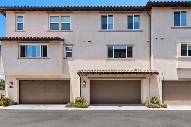 3510 Brody Way, Oceanside, CA 92056 - view of front of home with stucco siding and an attached garage