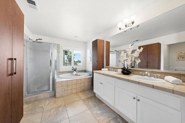 1412 Long View Dr, Chula Vista, CA 91915 - bathroom featuring a bath, double vanity, a shower stall, and tile patterned flooring