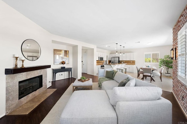 1412 Long View Dr, Chula Vista, CA 91915 - living room with a high end fireplace, dark wood finished floors, and recessed lighting