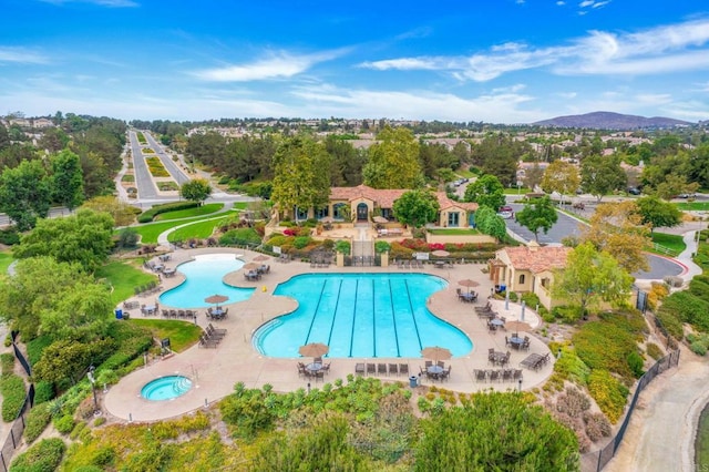 1412 Long View Dr, Chula Vista, CA 91915 - community pool featuring a patio area and view of wooded area