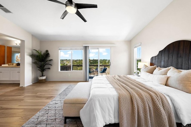 1412 Long View Dr, Chula Vista, CA 91915 - bedroom featuring access to exterior, light wood-style flooring, multiple windows, lofted ceiling, and ensuite bath