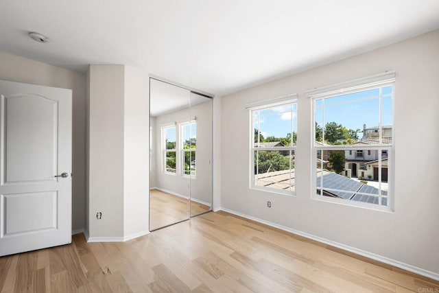 1412 Long View Dr, Chula Vista, CA 91915 - unfurnished bedroom featuring light wood finished floors and a closet