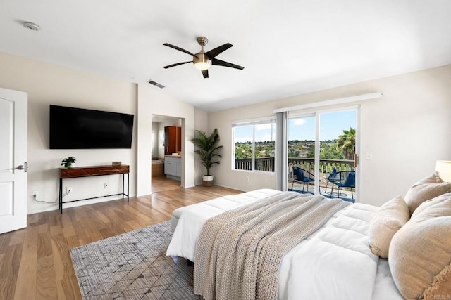 1412 Long View Dr, Chula Vista, CA 91915 - bedroom featuring access to exterior, vaulted ceiling, wood finished floors, a ceiling fan, and ensuite bath