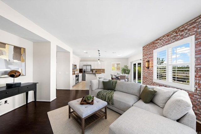 1412 Long View Dr, Chula Vista, CA 91915 - living area featuring light wood-style floors, plenty of natural light, recessed lighting, and brick wall
