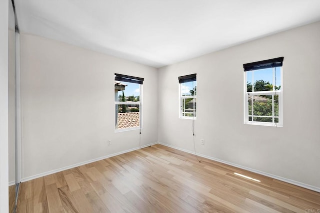 1412 Long View Dr, Chula Vista, CA 91915 - spare room featuring light wood-style flooring and baseboards