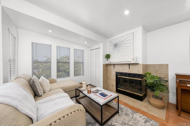 1802 Via Las Palmas Unit 36, National City, CA 91950 - living area with a tile fireplace, recessed lighting, and wood finished floors